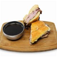 French Dip · Half pound house roasted shaved prime rib, melted provolone
cheese, french loaf, au jus.
Mak...