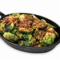 Brussels Sprouts · Pan roasted and tossed with bacon and truffle balsamic glaze.