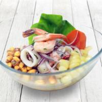Ceviche Mixto · Fresh shrimp, calamari, tilapia, scallops, and octopus marinated in freshly squeezed lime ju...