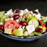 El Greco · Fresh greens with tomato wedges, Greek olives, feta cheese, onions, cucumbers and oregano.