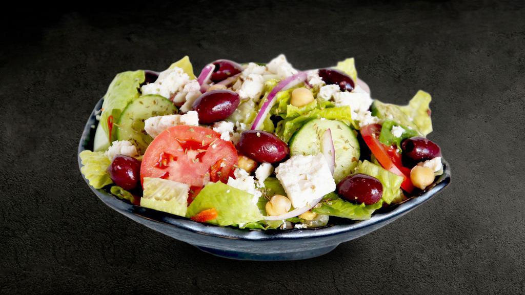 El Greco · Fresh greens with tomato wedges, Greek olives, feta cheese, onions, cucumbers and oregano.
