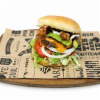 Taphouse Burger · 1/2 lb black angus burger, provelon cheese, applewood smoked bacon, avocado, lettuce, tomato...