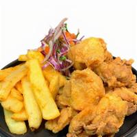Chicharron De Pollo · 1/2 Boneless chicken marinated and deep fried. Served with a side of fries.
