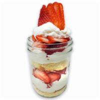 Strawberry Shortcake · Sweet vanilla cake alternating with layers of fresh, juicy strawberries and rich fresh whipp...