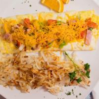 Western Omelet · Cheese, ham, bell pepper, onions, and tomatoes.