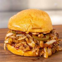 Pulled Pig Sandwich · Fistful of 14 hour roast pork, chipotle mayo, grilled onions, mama Tuddy's candied jalapeños...