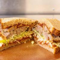 Green Chili Meatloaf Sandwich · Slab of chilled green chili meatloaf, pepper Jack cheese, bloody Mary ketchup on whole grain...