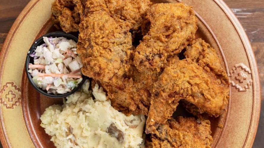 Pickle Brined Fried Chicken - 6 Pc · Six pieces of light and dark pickle brined fried chicken. Served with Granny's mashed potatoes, porter infused sausage gravy, Southern slaw.