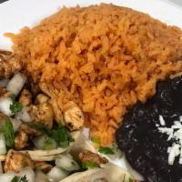 Enchiladas De Mole · Stuffed tortilla w/chicken topped w/our traditional mole poblano ; shedded lettuce, sour cre...