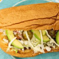 Tortas · Toasted Bread with a Layer of Beans, Mayonnaise, Lettuce, Tomato, Onion, Avocado, Jalapeños,...