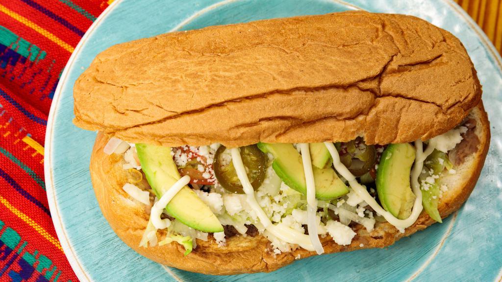 Tortas · Toasted Bread with a Layer of Beans, Mayonnaise, Lettuce, Tomato, Onion, Avocado, Jalapeños, Cheese and your Choice of Meat.