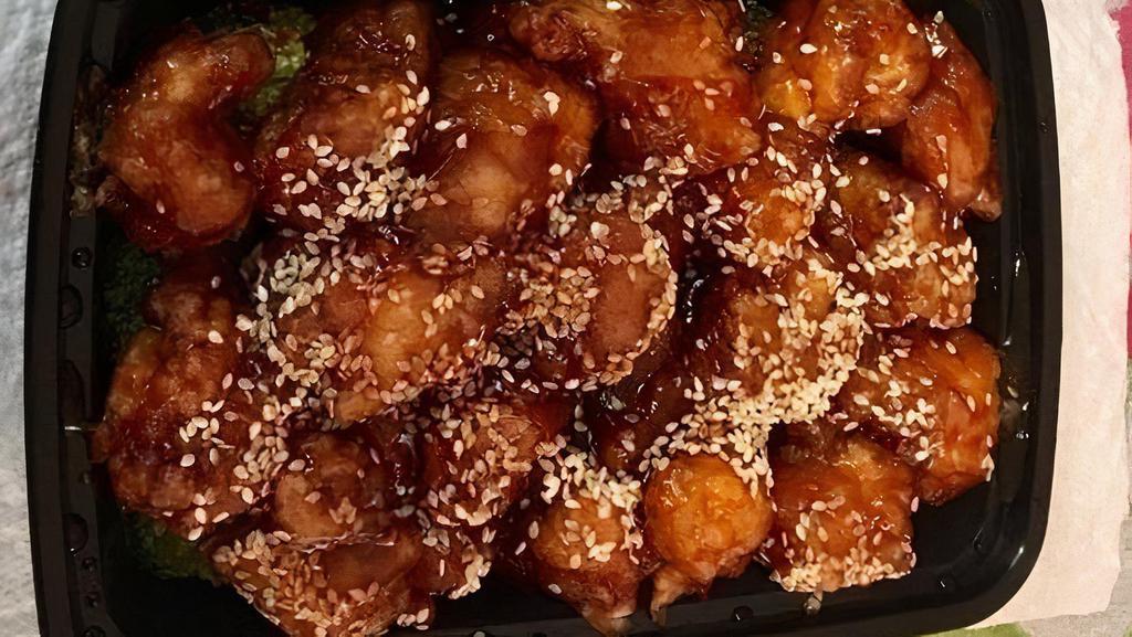 Sesame Chicken · Chunks of batter fried chicken sprinkled roast sesame seeds.