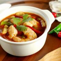 Large Tom Yum Soup · Light sweet and sour soup with a touch of spiciness of chili paste and the aroma of lemon gr...