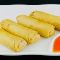 Spring Roll (1 Roll) · Deep-Fried wrapped spring rollskin, stuffed with clear noodles, cabbage, carrot, and served ...