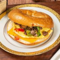 Steak, Egg And Cheese · Steak, 2 eggs; fried or scrambled, and choice of cheese in choice of bread.