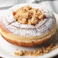 Peaches + Cream · 24hr brioche layered with vanilla mousse + peach compote, topped with oat crumb streusel + p...