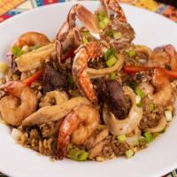 Chaufa Mar Y Tierra · A Chinese-Peruvian chicken, steak, and seafood fried rice fusion. Accompanied with mussels, ...