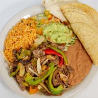 Beef Fajita Plate · 8 oz of marinated beef fajitas with peppers and onions, side rice, beans, guacamole salad an...