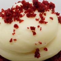 Red Velvet · A red velvet cupcake topped with a cream cheese icing and red velvet cake crumbles.