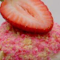 Strawberry Crunch · A strawberry cupcake filled with a strawberry jam, topped with a vanilla buttercream, a stra...