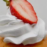 Strawberries & Cream · A strawberry cupcake filled with a strawberry jam, topped with a vanilla whipped icing, and ...