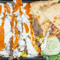 Lamb Over Rice & Salad · Gyro lamb marinated with Box'd seasoning, herbs, virgin olive oil and slowly cooked on a ver...
