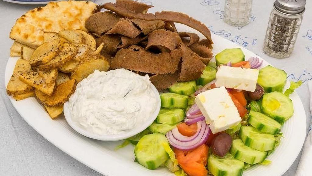 Gyro Platter · Greek salad, pita, tzatziki, and choice of side.