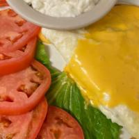 Egg White Cheese Omelet · Egg white omelet with non-fat cheese, tomato slices, cottage cheese, and dry whole-wheat toa...