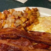 Bacon & Eggs · Four slices of hickory-smoked bacon and two eggs with home fries.