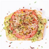 Avocado Toast With Tomato & Sprouts · Fresh-mashed avocado with salt lime fresh tomato & alfalfa sprouts on your choice of toasted...