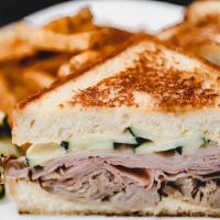 Cubano · house smoked pulled pork, black forest ham, house pickles, swiss, dijon aioli, grilled texas...