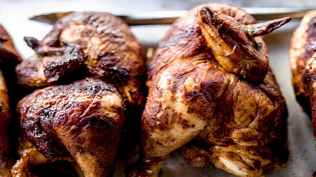 Rotisserie Chicken - Family (Whole Or Half) · dry rubbed, slow-roasted on our woodfired rotisserie. order by 1/2 or whole. (sides sold separately). GF