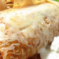 Carne Asada Burrito · Served with rice, beans, onion, cilantro, and salsa.
