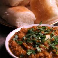 Pav Bhaji · Popular fast food made of thick mixed vegetable curry cooked in a special blend of spices & ...