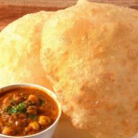 Chole Bhature · Fluffy deep-fried bread made of unleavened all-purpose flour served with a very flavorful ch...