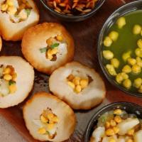 Pani Puri / Gol Gappas · (8 pcs) Hollow & crispy fried flour balls filled with potato, chickpeas served with tangy fl...