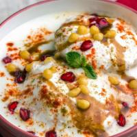 Dahi Bhalla · Deep-fried soft lentil fritters that are dunked in a creamy yogurt sauce & topped with spicy...