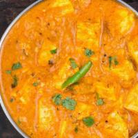 Shahi Paneer · Indian cottage cheese cooked in a creamy sauce made with onions, tomatoes, cream, & spices (...