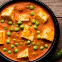 Matar Paneer · Green peas & Indian cottage cheese cooked in an onion & tomato-based curry, spices, & herbs ...