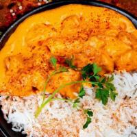 Butter Chicken · Arguably the most popular Indian dish, this contains boneless chicken pieces in a spiced but...