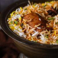 Chicken Biryani · Rice dish made with layers of boneless chicken & aromatic spices all steamed together served...