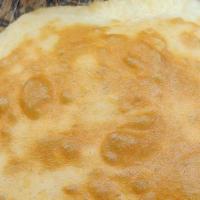 Bhatura · Deep-fried puffy bread made from unleavened all purpose flour & is larger than a Puri (Veget...