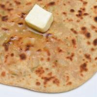 Plain Parantha · Round flat unleavened whole wheat bread fried on a griddle; Vegan when served without butter...