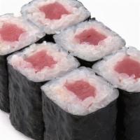 Tuna / Salmon / Yellowtail Roll · 