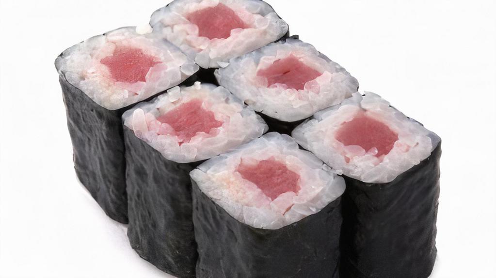 Tuna / Salmon / Yellowtail Roll · 