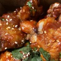 Korean Fried Chicken Wings · With caramelized kimchi and all of those Asian spices. These guys will keep you coming for m...