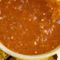 2 Oz Red Salsa (Salsa Roja) · The roasted tomato, roasted garlic and the fresh herbs with this salsa a nice profile