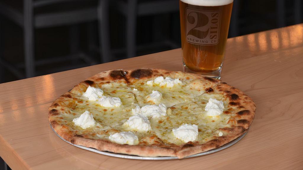 White Pizza · Mozzarella and ricotta cheese, fresh garlic, extra virgin olive oil.