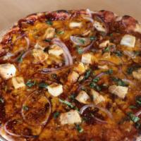 Bbq Chicken Pizza · Tangy barbeque sauce, cheddar cheese, diced chicken, red onions, cilantro.