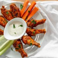 Wings · Eight smoked wings served with a choice of celery or carrots and a choice of a ranch or blue...